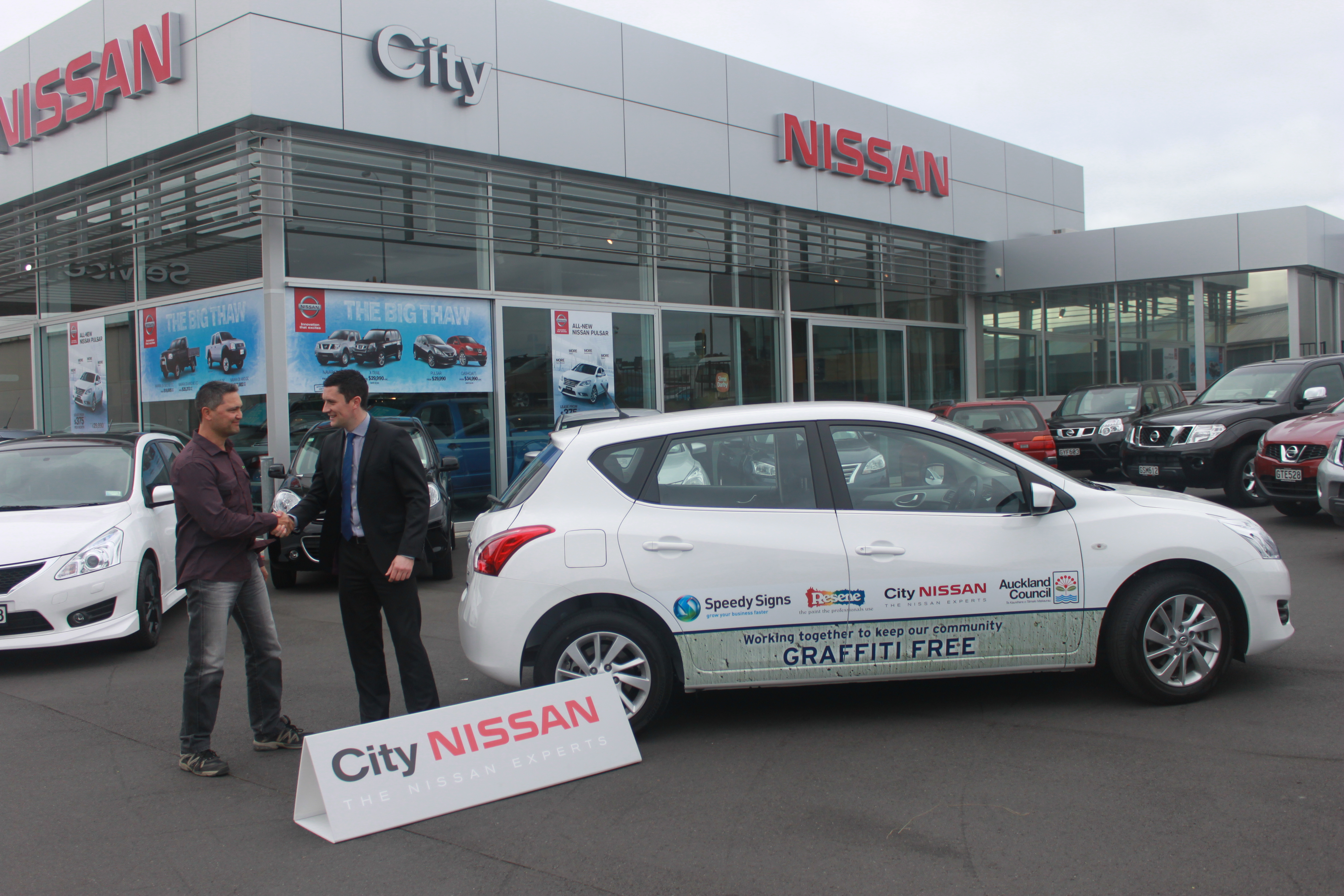 Corrie and Niall handshaking